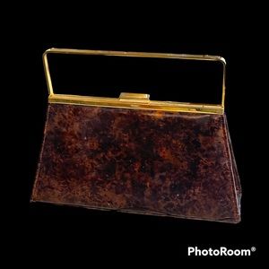 Tortoise shell hand bag